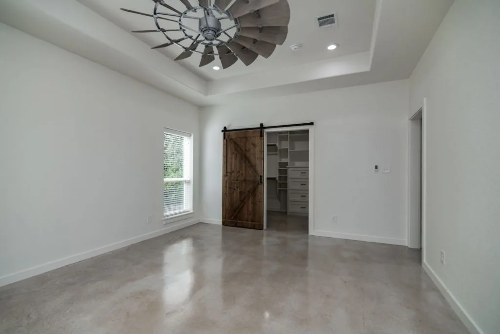 Texas Barndominium master bedroom door to closet