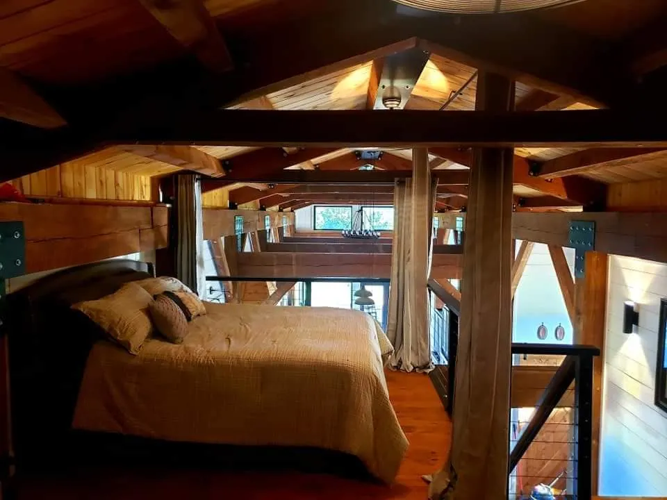 Loft guest bedroom in a barndominium in Arkansas