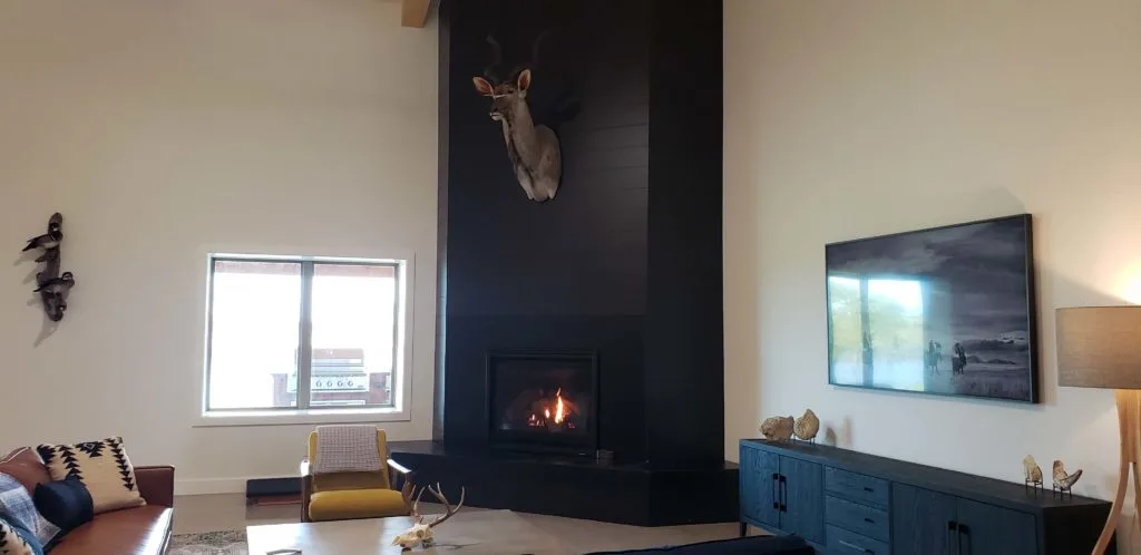 Oklahoma Barndominium living room with huge fireplace