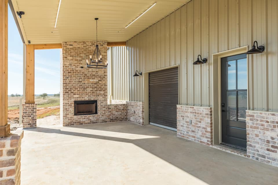 Houston Texas Barndominium Side Porch with Fireplace
