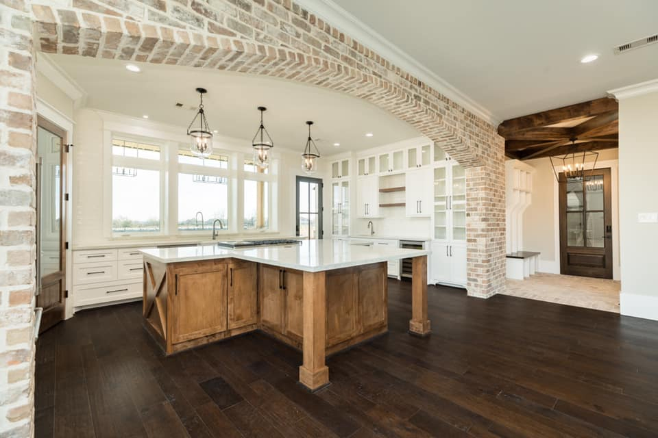 Houston Texas Barndominium Kitchen with Island and Archway