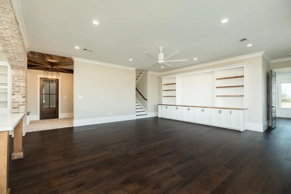 Houston Texas Barndominium Open Concept Living Room, Staircase and Back Door