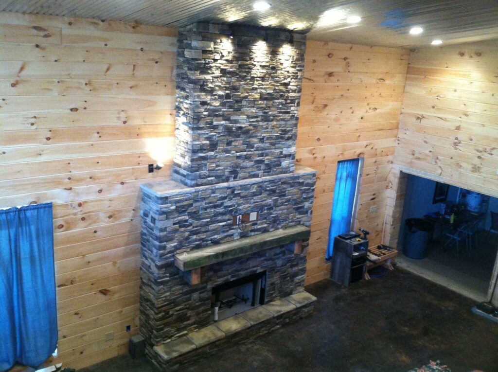 Finished stone fireplace installed.