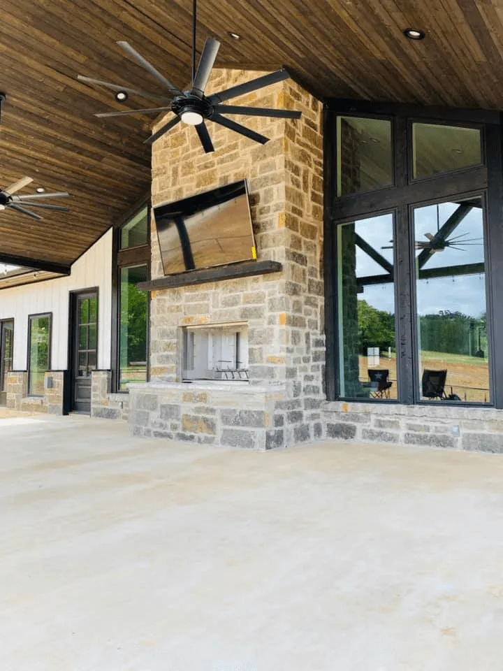 Outdoor Brick Fireplace  with TV seta, Floor-to-ceiling windows, Huge ceiling fans