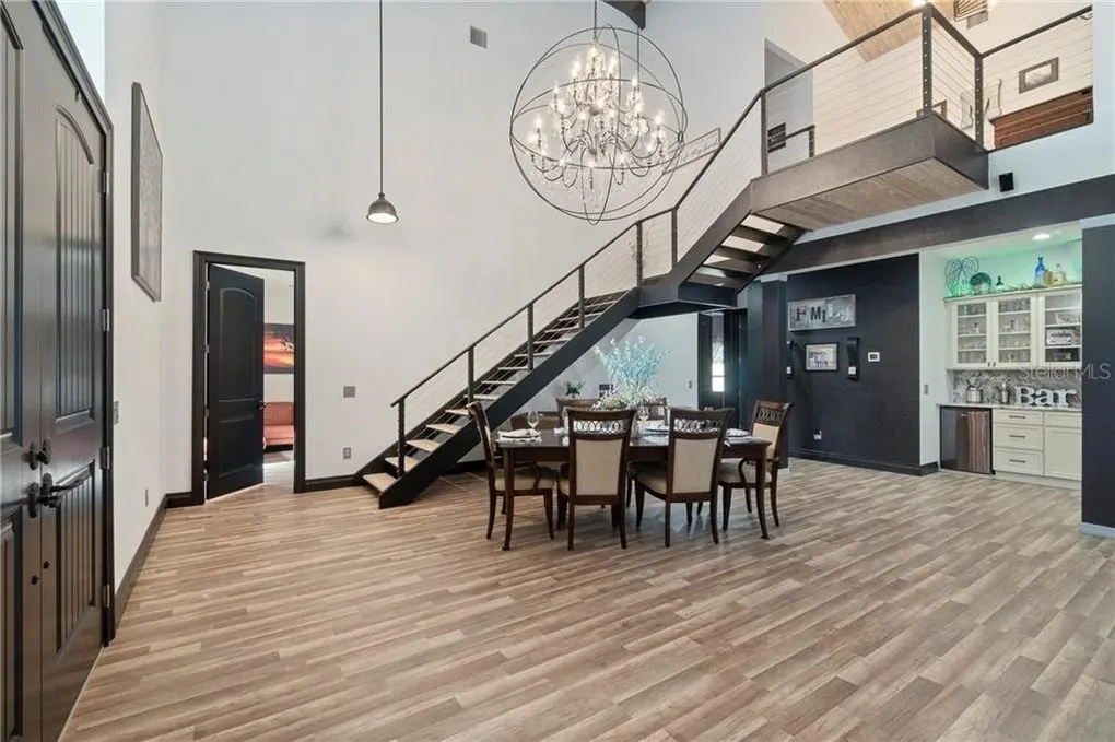 open floor plan with barndominium stairs 