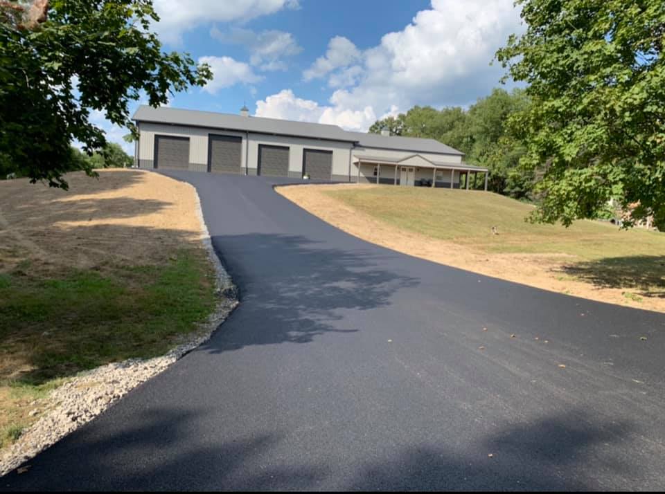 concreted driveway going to the barndominium