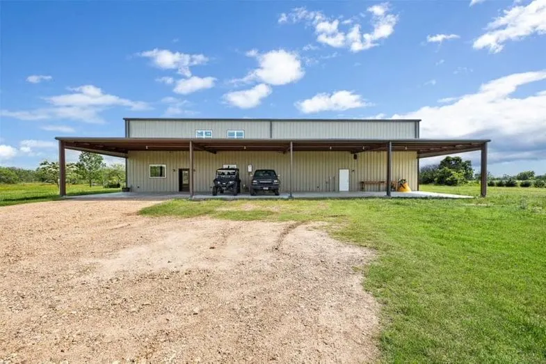 Exterior view, looking at carport