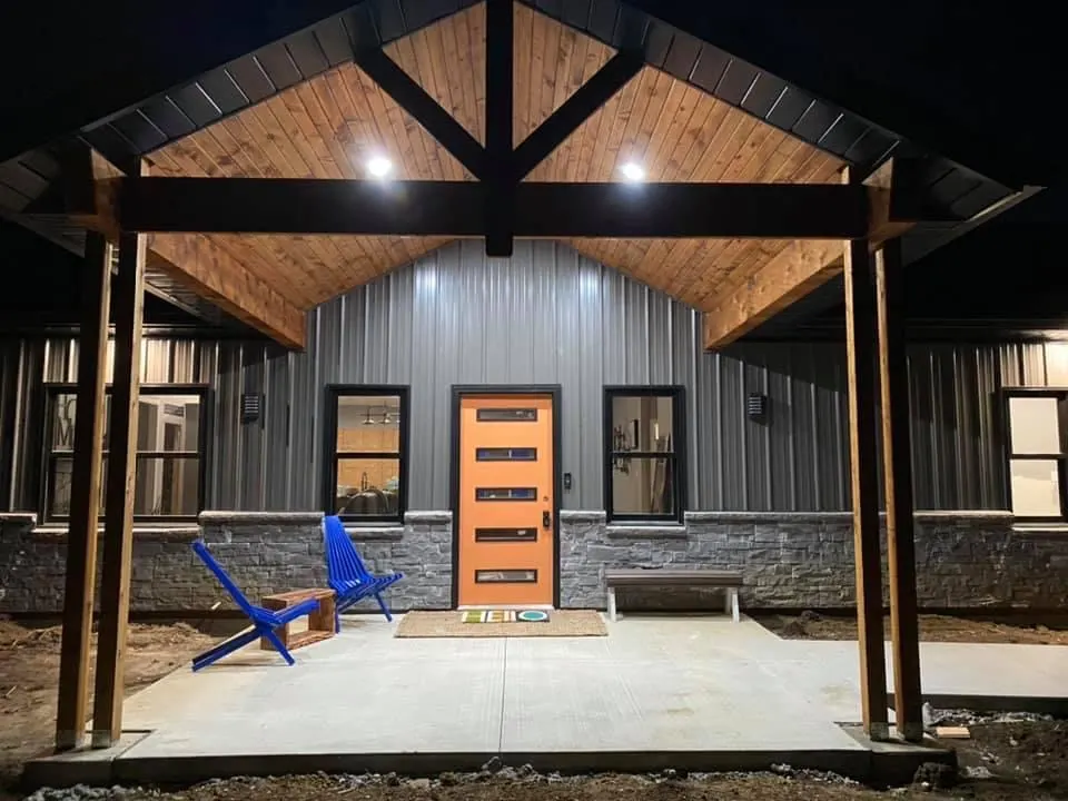 Front porch with stained wood ceiling coverings