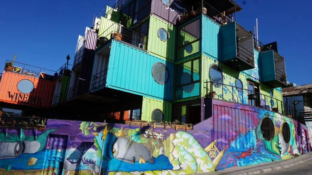 Stacked shipping containers converted to colorful home