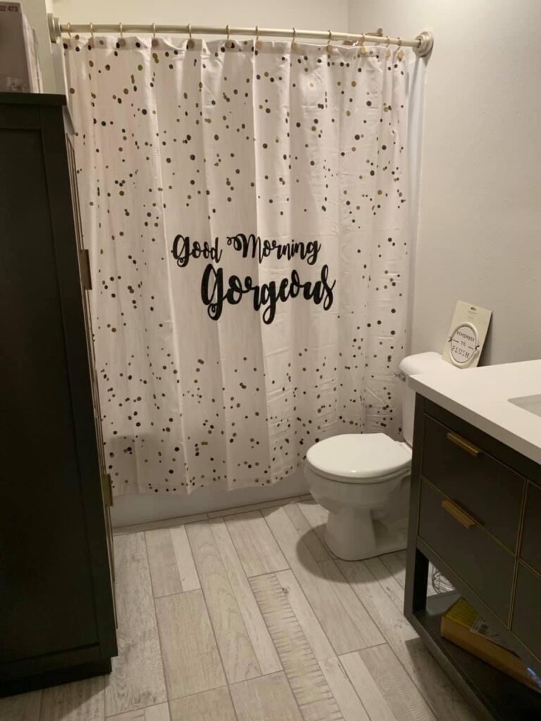 Guest bathroom with shower curtain