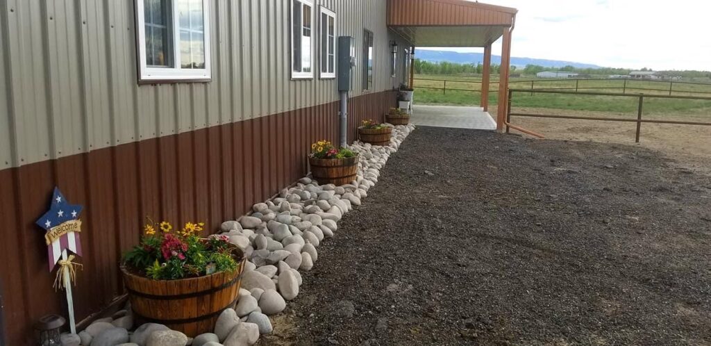 Beautiful Wyoming Barndominum for Horse Lovers by the Timothy Family lovely flower barrels