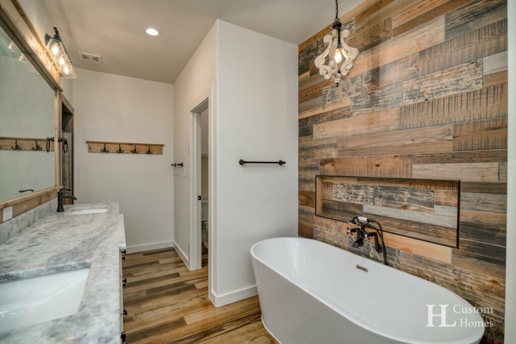Master Bathroom tub, double sink, shower and toilet areas,