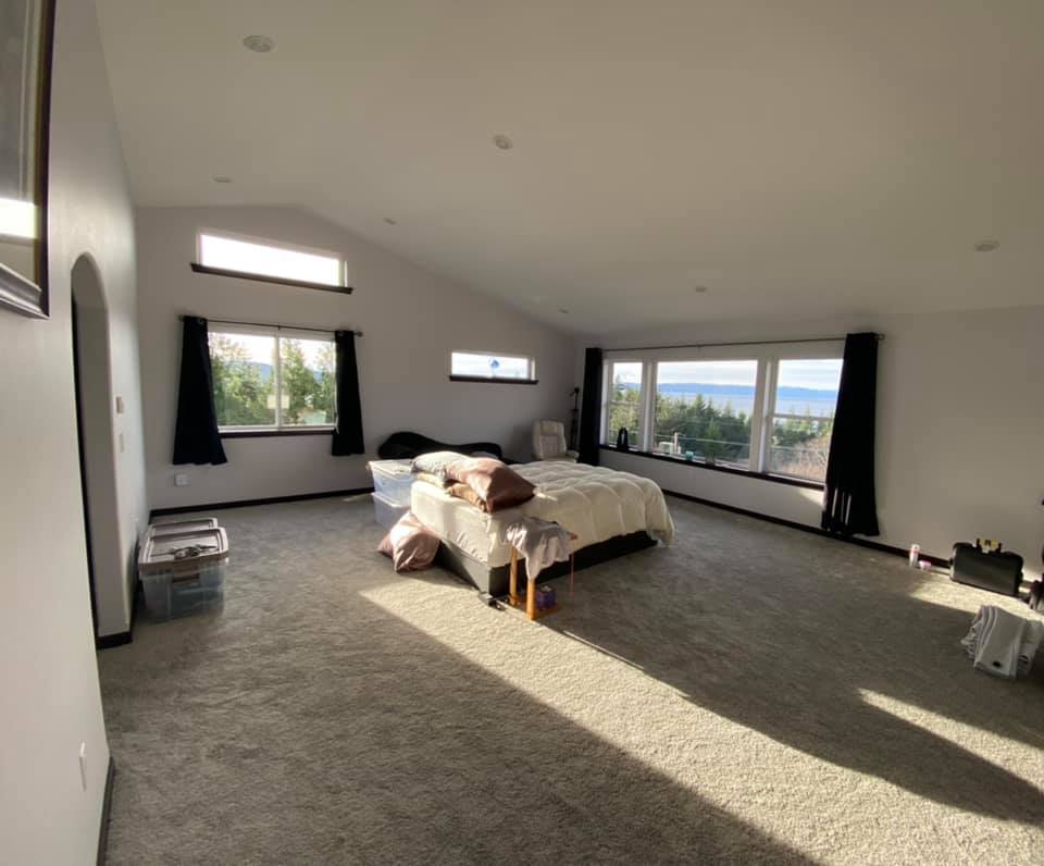 Carpeted master bedroom