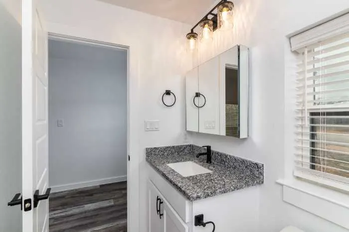 Bathroom with white painted walls and sink