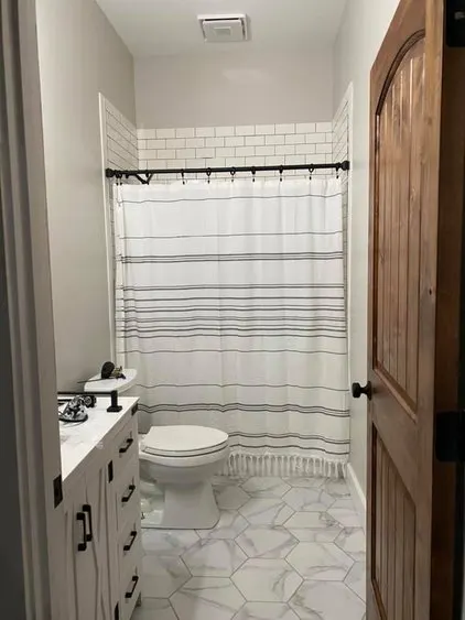 Barndominium Under 250K - Guest Bathroom 