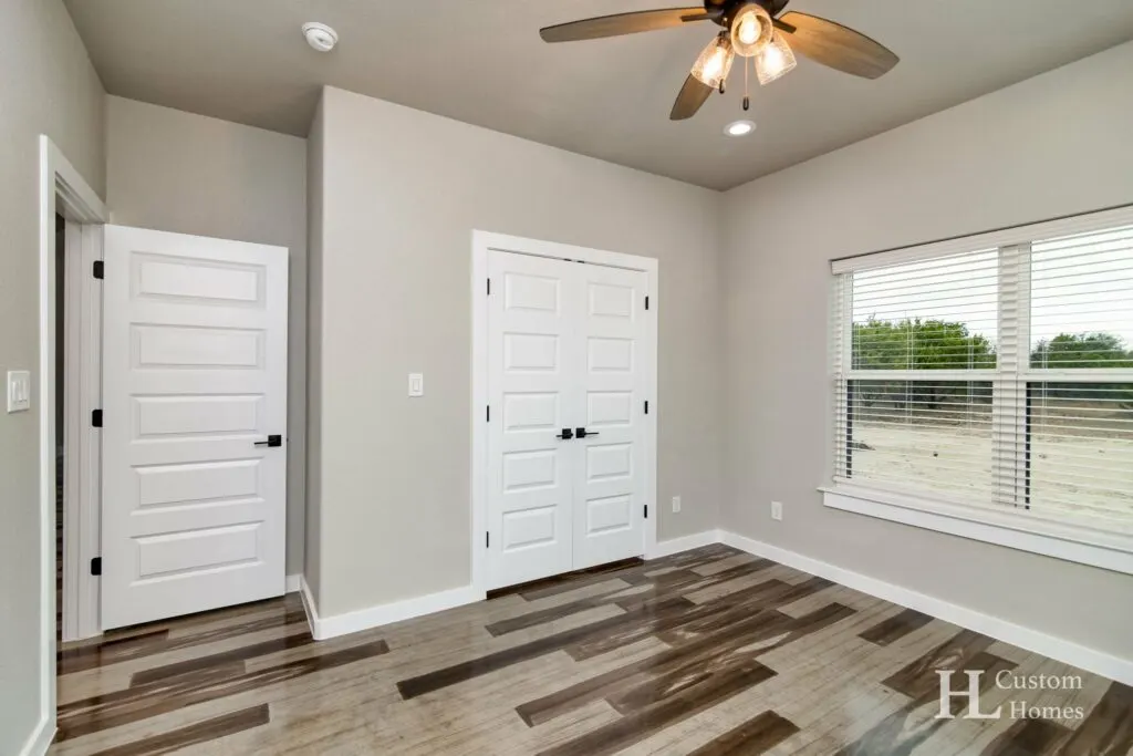 Weatherford, Texas Barndominium by HL Custom Homes - Guest Bedroom Closet 2