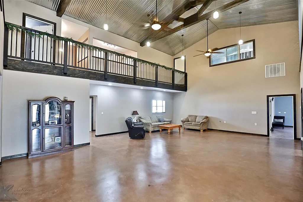 Open plan barndominium with mezzanine