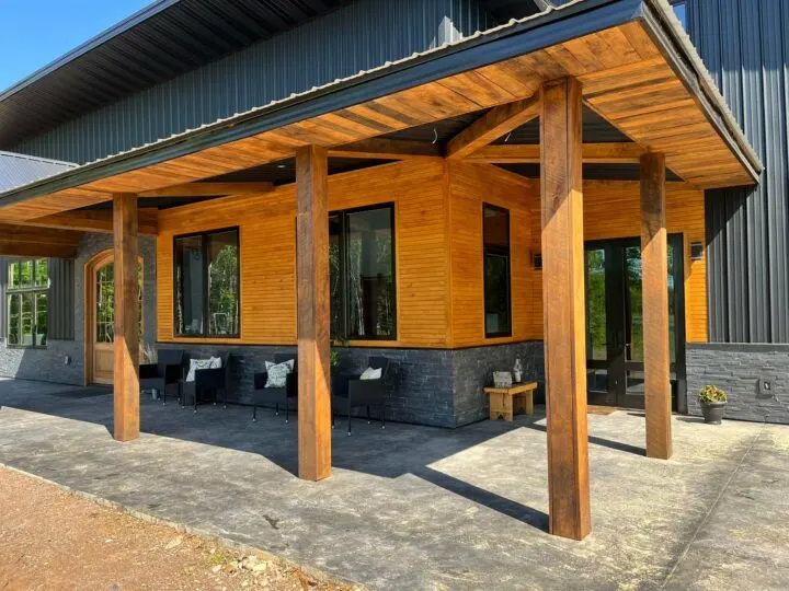 Pole barn home in Alabama with porch