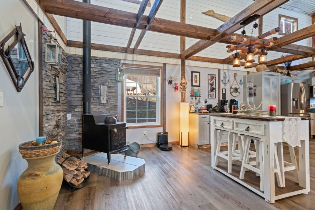 Pole barn kitchen with exposed beams 