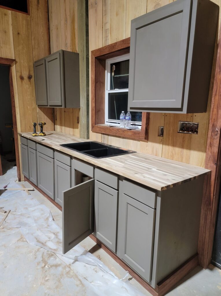 Rustic Louisiana barndominium kitchen sink.